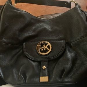 Micheal Kors black leather hobo style handbag